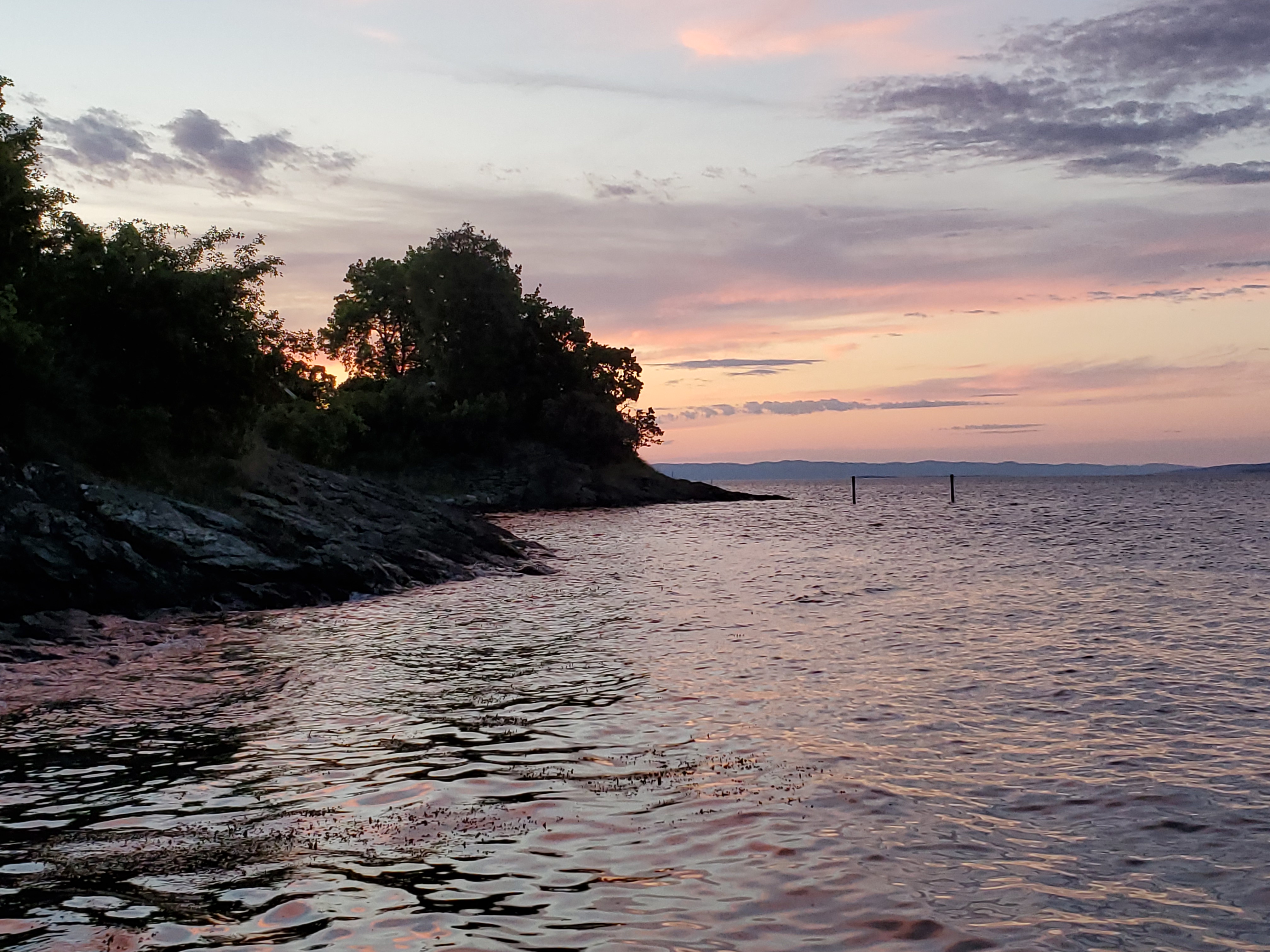 Sunset over fjord at Midsummer